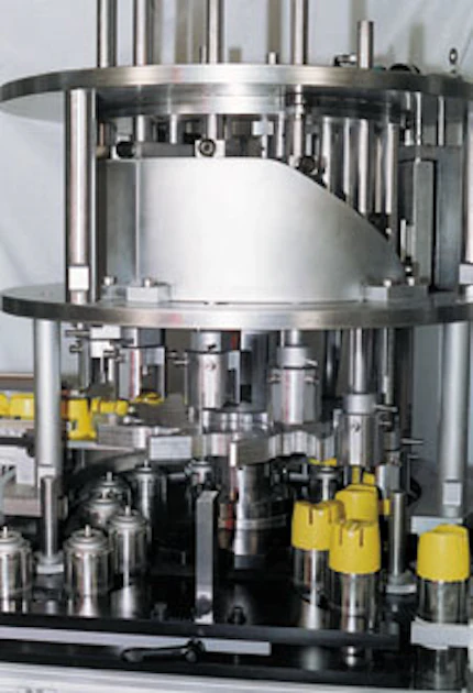 Haumiller Engineering: Rotary overcapper From: Haumiller Engineering ...