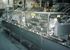 This new shrink wrapping line, purchased at Pack Expo in '98, has allowed Axxess Technologies to increase its speed from 30 pack