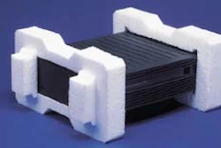 The molded foam end cap's living hinges allow it to store flat. During packaging, a line worker simply pulls up on the flaps, le