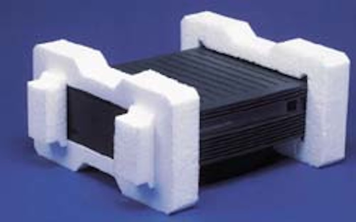 The molded foam end cap's living hinges allow it to store flat. During packaging, a line worker simply pulls up on the flaps, le
