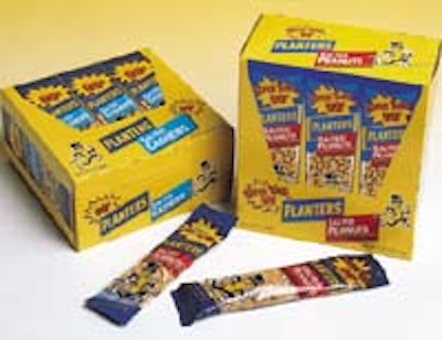 Planters' 'tubed' peanuts are sold at retail in colorful display cartons (above). Photo below left shows the carton infeed stati