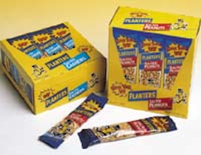 Planters' 'tubed' peanuts are sold at retail in colorful display cartons (above). Photo below left shows the carton infeed stati