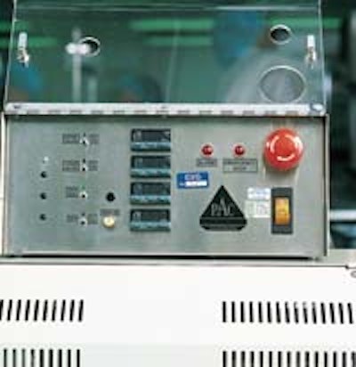 A worker at a Baxter Healthcare plant in Irvine, CA, seals sterile pouches with a band sealer. Close-up of the control panel (to