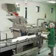 The electronic tablet counter (above) is a twin-style system that funnels tablets down two parallel paths and into containers. A