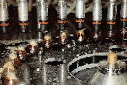 The78-valve filler has no bottle platforms that carry bottles through the filling process. That task is performed instead by a s