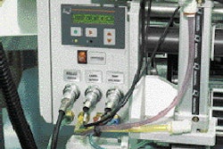 A tamping arm places the p-s label (left). Shiseido?s labeler came with digital controls (above
