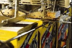 Boxes of Sunlight laundry detergent, conveying upside down, are bottom-sealed (above) after scoop dropping and filling. At the p