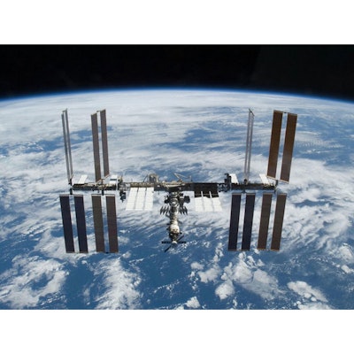 Space Station is photographed soon after the space shuttle Atlantis and the station began their post-undocking separation. Image