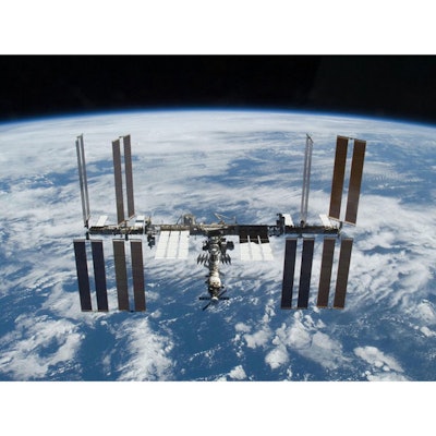 Space Station is photographed soon after the space shuttle Atlantis and the station began their post-undocking separation. Image