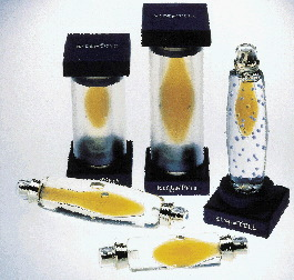 Kiss & Tell?s packaging includes outer packaging that acts as a stand to hold and show off the uniqueness of the bottle. The des