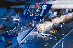 The output from all ten robots is handled by a single flow wrapper that wraps trays at 90/min (right). Operators can monitor the