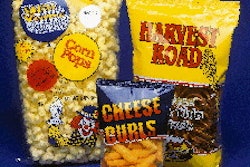 Cross-feed conveyors receive product from a distribution conveyor for direct delivery to the combination scales. Shown here is t