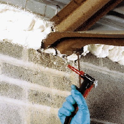 Users spray foam from the returnable containers onto everything from buildings (shown) to refrigerated trucks.
