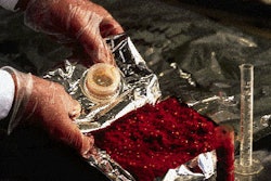 For illustrative purposes, an aseptic bag is sliced open to reveal the gland and the bottom membrane. During filling, product fl