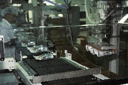 Downstream functions at Ryt-way1s Lakeville, MN, pet food packing plant include robotic case packing (top), case erecting (cent