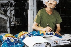 Roland Baker (inset) checks the nitrogen level in bags of Wise potato chips. To package its chips, Wise Foods, uses 33 bagging m