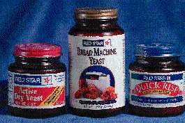 Arotating plate ?broadcasts? or spreads yeast into a bisected funnel (above, inset) that channels the flow of yeast into two ja