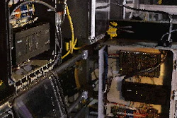 These two control cabinets show two of the 126 micro PLCs on the line, each the size of a common house brick. The PLC on the lef