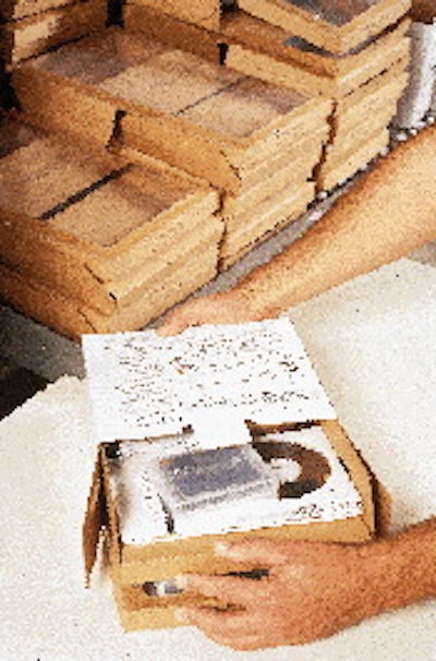 Hewlett-Packard?s tape drives are placed in a clamshell-style suspension package (above), which is then placed into an outer box