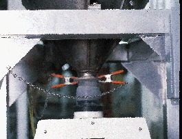 Rick Vavra, GE Plastics? materials and logistics manager (above), holds samples of the engineering resins made and packaged in