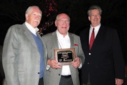 NEW INDUCTEE. Contract Packaging Association Executive Director Ed Landon (left) and President John Riley (right) congratulate S