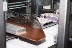 Film is advanced evenly through the automatic L-sealer by a powered unwind and a side chain gripper. Inset photo shows cartoned