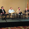 PANEL DISCUSSION. Thomas Bacon (far right), founder and president, Aaron Thomas Co., discusses challenges facing the contract pa