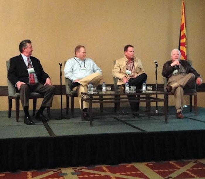 PANEL DISCUSSION. Thomas Bacon (far right), founder and president, Aaron Thomas Co., discusses challenges facing the contract pa