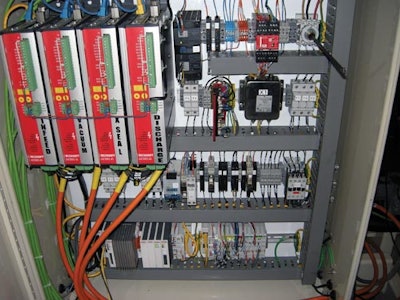 Servo look. Servo technology, much of it represented in this control cabinet, simplifies machine building and installation.
