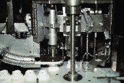 In the final station of the intermittent-motion capper (far left), a load cell senses if torque is too low so that the bottle ca