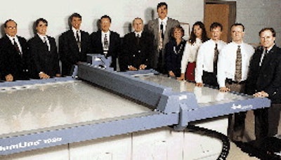 At the dedication at Michigan State, the following are shown (left to right) around the new cutting table: Dr. Harold Hughes, MS