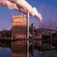 Plumes of steam, a typical byproduct of the papermaking process, are exhausted from Georgia-Pacific?s Crossett, AR, paperboard m