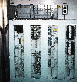 The control cabinet for Line 2 that houses the main PLC would be considerably more complicated without a network, requiring at l