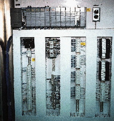 The control cabinet for Line 2 that houses the main PLC would be considerably more complicated without a network, requiring at l