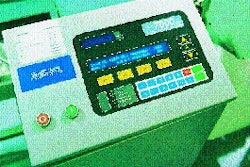 Trays loaded with Keebler?s chocolate chip cookies are conveyed through the metal detector and onto the platform of the checkwei