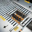 Cases are configured in a variety of formats by means of the case turner (inset) running just ahead of the automatic palletizer