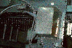 Preforms are transferred by their necks (above) in four lanes towards a heating oven