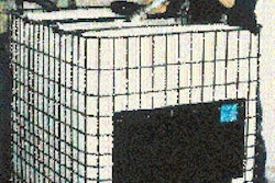 At Wacker Silicones, an operator fills an IBC with a silicone-based product. Consisting of an HDPE bottle enclosed in a steel ca