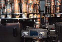 Cups are denested and sent into the packaging line by two rotary cup feeders, each of which holds 20 stacks of 50 nested cups.