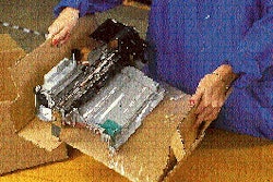 HP?s delicate printhead replacement assembly is immobilized beneath the flexible urethane film that?s spot-glued at the edges to