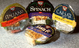 2:Controlled permeability in the film lidstock is the key to extended shelf life on this salad bowl.