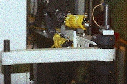 As many as six upstream packaging lines can feed into the rotary tower stretch wrapping machine. Electrical heating strips on al