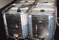 A galvanized steel cage permits Pepper Source personnel to see through to the inner HDPE liner to gauge product level