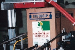 A custom-engineered flat sealing head induction-seals recessed closures in jug-in-box containers