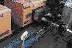 An array of print heads on both sides of the conveyor leading to finished goods inventory lets Borden print variable information