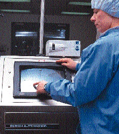 Pressing arrow keys on the touchscreen display (above) trains the camera to focus in on the date/lot code. One touchscreen disp