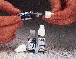 In a dramatic display of efficient small-part handling, 3-mL containers are delivered to the monobloc?s turret via a chute (ab