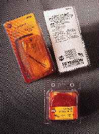 Peterson Mfg.?s new platform-style blisters (shown front and back, top) provide an improved look compared to its previous clamsh