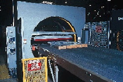 Panels used to build office cubicles are stretch wrapped on a horizontal stretch wrapper with metallocene-resin-based stretch f