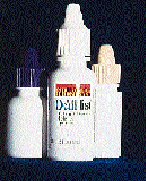 This part of the monobloc (above) shows bottles indexing first to the filling heads, then to the plugging stations. Tracks feedi